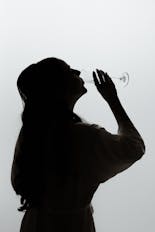 The mother of the bride watching the earrings that the bride will wear