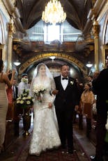 Father and son holding hands