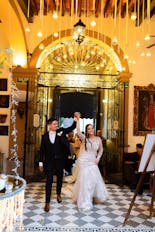 Groom and bride about to kiss