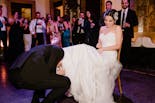 Husband putting the ring on his wife