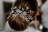 Hairstyle and headdress detail for bride