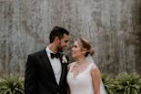 Groom and bride about to kiss