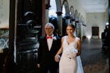 Bride walking with her dad to the altar