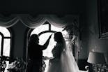 Groom cleaning his shoes for his wedding