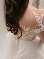 Groom coming out of bathing and putting on his suit for his wedding